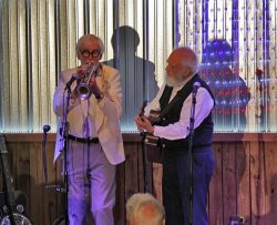 Jerry teaches Bobby how to play the trumpet. Jerry teaches Bobby how to play the trumpet.