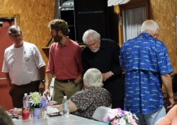 Sean mixes with the guests.