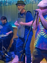 Guest musician Dr. Fred Goldman playing the frottoir,